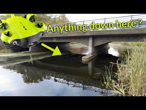 Treasure hunting under bridge with underwater drone