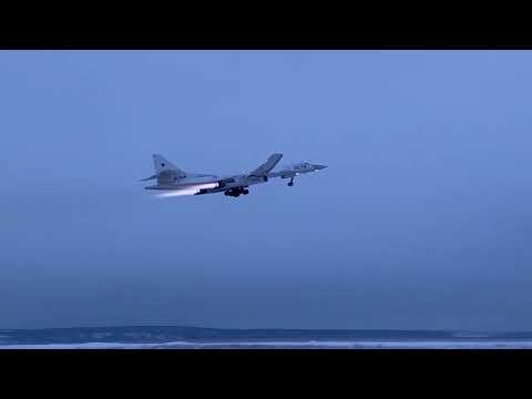 Russian Tu 160 strategic bombers conduct scheduled flights over Arctic Ocean. #war #ukraine #russia