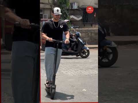 Bollywood Update: Kunal Khemu embraces eco-friendly travel, spotted on an electric scooter.