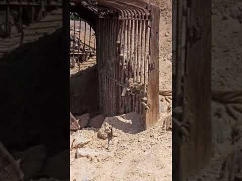 Mars perseverance rover capture A broken iron door on the desert of this planet